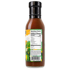 A bottle of Stanky Sauce Florida Sunshine BBQ Sauce from the side showing the Nutrition Facts, Ingredient listing and UPC